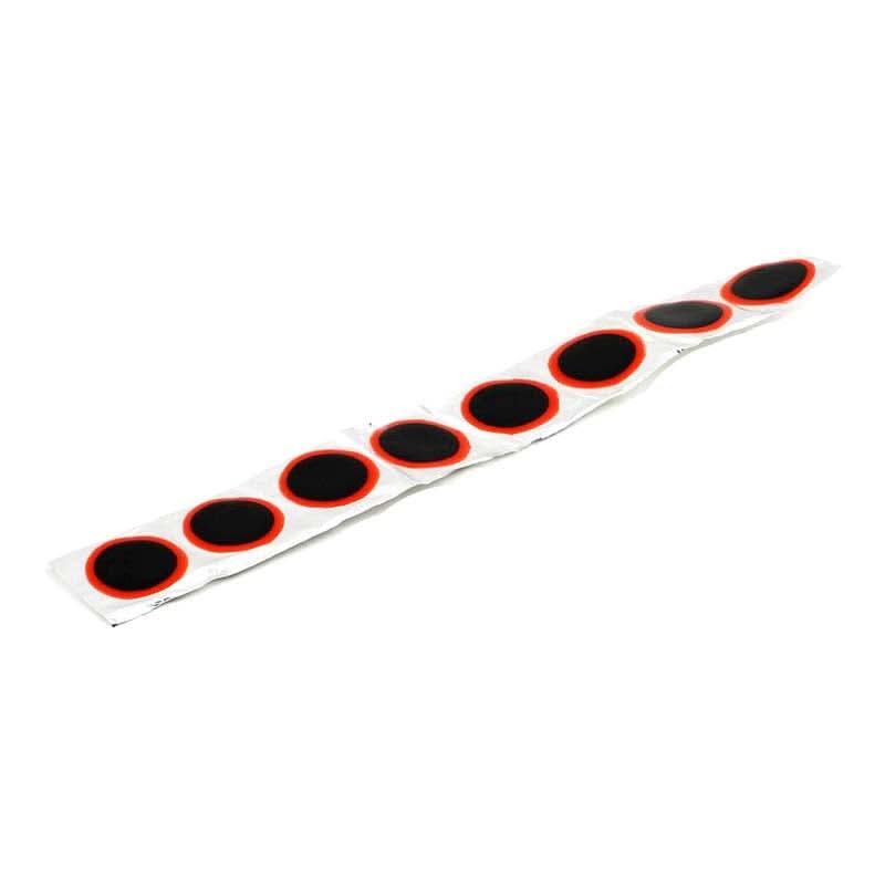 Inner Tube Patch & Repair Kit (Blemished) - Featuring a row of black circular patches, essential for fixing punctured inner tubes. Includes tire levers, rubber cement, and a metal rasp for effective repairs.