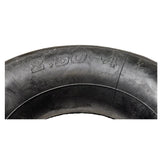 Close-up of the 2.80/2.50-4 Scooter Inner Tube, showcasing intricate tread details and a bent valve stem, designed for use with mobility scooters, recreational electric scooters, and utility carts.