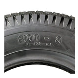Close-up of the 14x3 (3.00-8) Black Pneumatic Mobility Tire with K372 Turf Tread, showcasing its detailed tread pattern designed for optimal traction and comfort on mobility scooters and power chairs.
