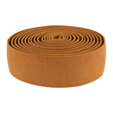 Origin8 Pro Cork Handlebar Tape in a roll, showcasing its soft, grippy texture on a white background, ideal for wrapping bike or tool handles for a slip-free grip.