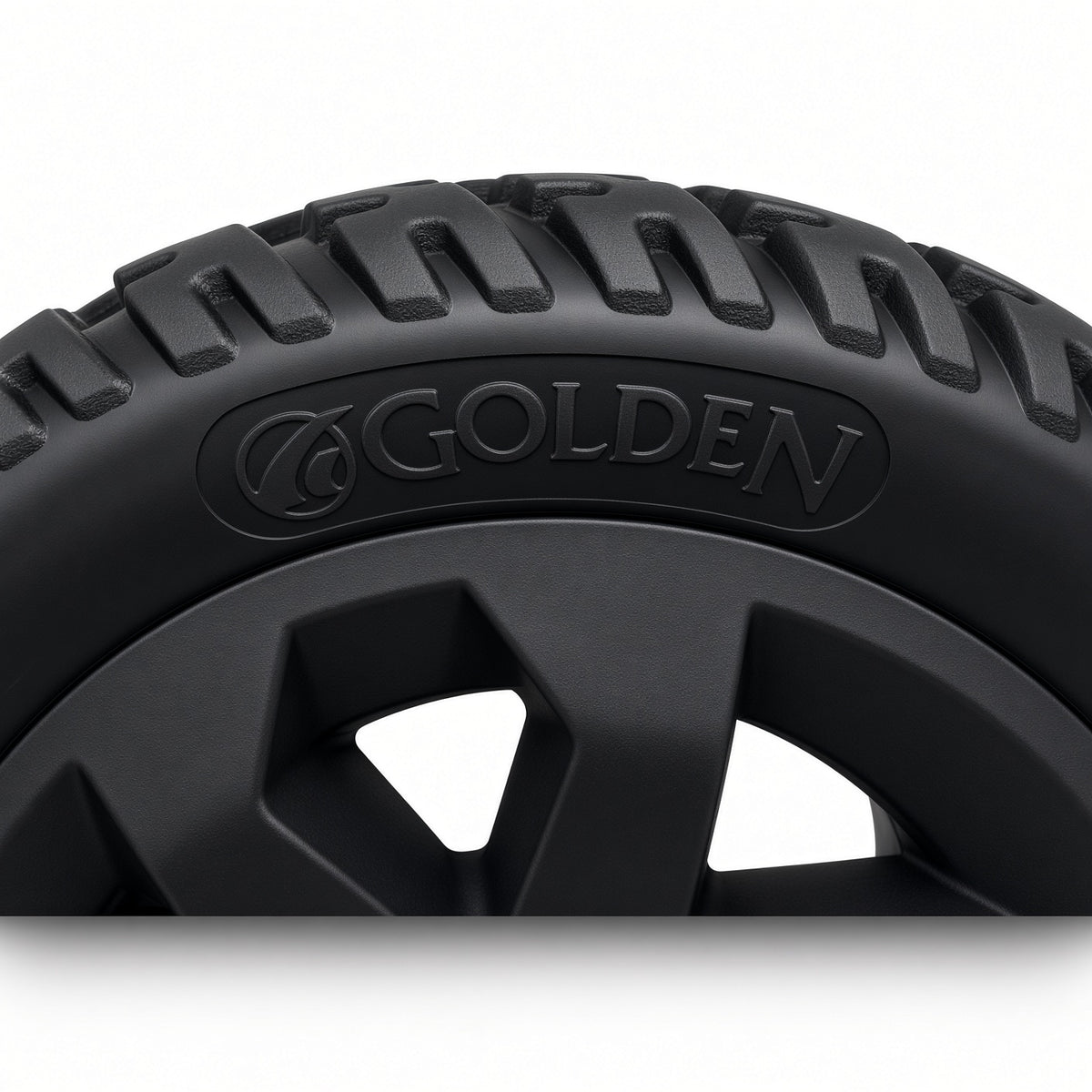 Close-up of the Golden logo molded into the tire sidewall of the Golden Companion II (GC340B/E & GC440B/E) rear wheel MBW-0023, with tread detail.