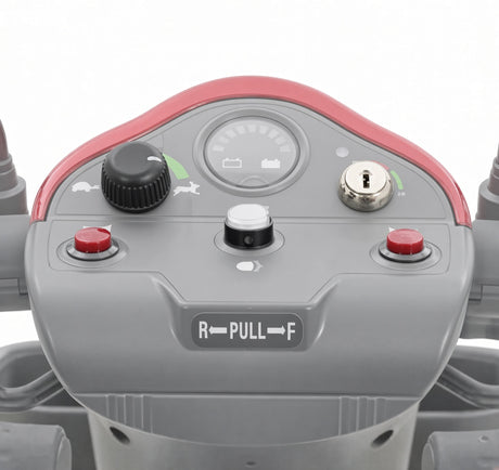 Golden Technologies MBM-C40-RHB red horn button shown installed on a Golden Companion scooter tiller console. Two red buttons are shown; this listing is for a single button.