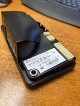R-Series Controller Assembly for Pride Victory 9 (SC609/SC709) & Victory 10 (SC610/SC710) Scooters (Blemished): A black electronic device with white and yellow buttons, designed for easy replacement in scooters.