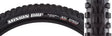 Close-up of the 26x2.5 Minion DHF DC/EXO/TR/WT Bicycle Tire, showcasing its tread pattern designed for optimal grip and rolling resistance, along with EXO sidewall protection.