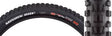 Close-up of the 27.5x2.5 Minion DHF 3CG/TR/DD Bicycle Tire, showcasing its knobby tread pattern designed for grip and control, with visible white text on the black rubber surface.