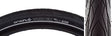 Close-up of 29x2.0 Reflective Vortex Bicycle Tire showing smooth, fast-rolling tread with water-evacuating grooves and textured shoulder blocks, designed for superior grip and safety in various road conditions.