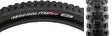 Close-up of the 29x2.2 Regolith Pro SCT Bicycle Tire, showcasing its alternating double block tread center and chain corner lugs, designed for versatile off-road handling and traction.