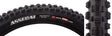 Close-up of the 29x2.5 Assegai EXO+/TR/WT Bicycle Tire, showcasing its alternating vertical knobs, deep siping, and large corner knobs for enhanced traction.