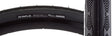 700x28 Squall Bicycle Tire close-up, showcasing its smooth, fast-rolling center with terraced shoulders for enhanced cornering grip, highlighting the puncture protection layer beneath the tread surface.