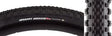Close-up of the 700x32 Happy Medium Pro Bicycle Tire showcasing its fast-rolling center section and aggressive outer edges for cornering control, with visible center and corner knobs for seamless transitions.