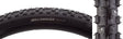 Close-up of the 700x35 Klondike Skinny Sport Bicycle Tire, highlighting its tread design with alternating studs and smooth center line, ideal for winter cycling on snow and ice.
