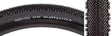 Close-up of the 700x50 Black/Black Venture TCS Bicycle Tire showcasing its supportive centerline tread, intermediate ridges, and outer knobs for enhanced traction and cornering on various terrains.