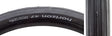 Close-up of the 650Bx47 Black/Black Horizon Road TCS Bicycle Tire, highlighting its smooth centerline and herringbone tread pattern designed for versatile performance on both pavement and dirt roads.
