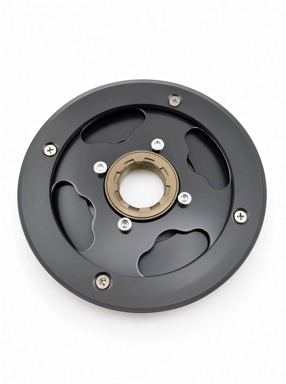 A circular black metal mechanical component with a central gold-toned ring, six silver screws, and cutout slots, photographed on a plain white background.