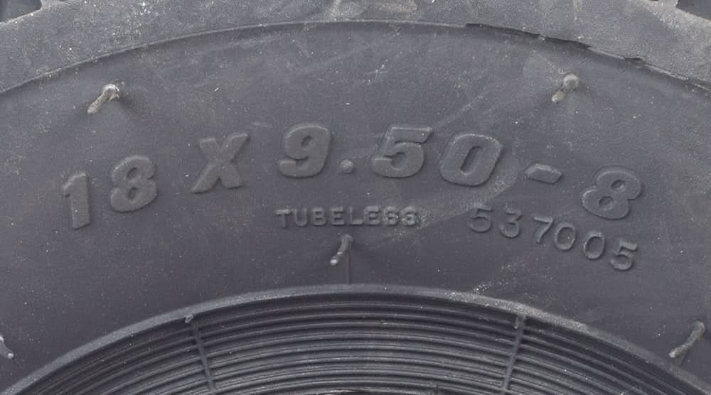 Close-up of the 18X9.50-8 Knobby Rear Tire for the Hammerhead Off-Road® GL-150 Go-Kart, showcasing its aggressive tread pattern designed for superior grip on slippery terrain.