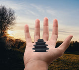 Joystick Rubber Boot for PG Drives Joystick Controllers (VSI, VR2, GC, and Remote Plus) shown held in a person's hand, illustrating the OEM replacement part's size and shape.