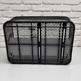 Market-Style Rear Basket for Bicycles (Axiom) (Missing Hardware): A black metal wire mesh basket designed for rear bike racks, featuring a vinyl-dipped finish, open top, and cut-away section for seat clearance.