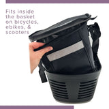 Hand holding the Insulated Front Basket Bag for Mobility Scooters, featuring a zippered main compartment and durable ripstop polyester construction.