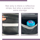 Close-up of the Insulated Front Basket Bag for Mobility Scooters, showing a person holding its zipper, with a blue bottle partially tucked into a side pocket.