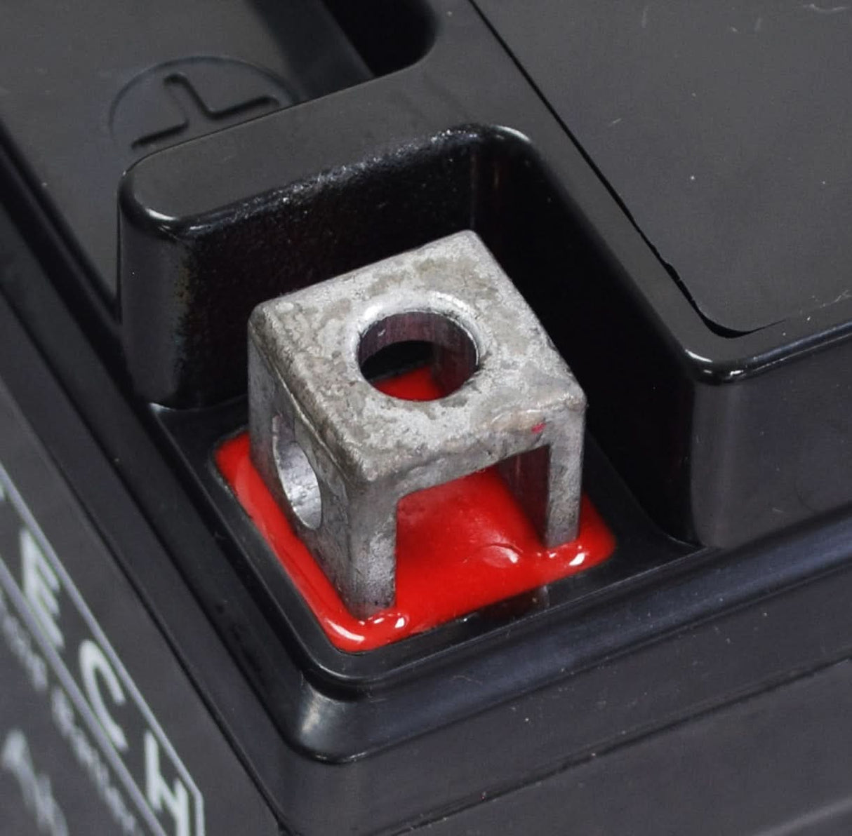 Close-up of a 12 Volt YTX4LB Replacement Sealed AGM Battery for TaoTao ATVs, showcasing its compact, maintenance-free design with visible terminals and secure casing.
