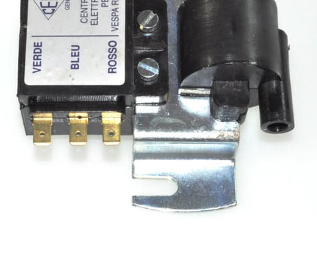 Close-up of the External Electronic CDI Ignition Coil Combination for Vespa Rally and VSE Scooters, showcasing the intricate machine parts essential for the scooter's ignition system.