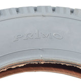 Close-up of the 12-1/2x2-1/4 Pneumatic Mobility Tire with C628 Power Express Tread, showcasing its knobby tread made from non-marking gray rubber.