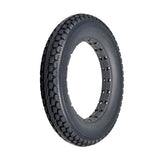 12-1/2x2-1/4 Dark Gray Solid Urethane Mobility Tire with Knobby Tread, showcasing close-up detail of tread pattern. Suitable for indoor and outdoor use, it's a flat-free, latex-free design.