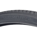24x1-3/8 (37-540) Black Pneumatic Wheelchair Tire with C63 Tread; close-up shows detailed tread pattern and sidewall markings. Fits Merits and other wheelchairs, suitable for both indoor and outdoor use.