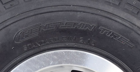 Close-up of the 3.00-4 (10x3, 260x85) Solid Front Wheel Assembly for the Drive Daytona 3 GT Mobility Scooter, highlighting the robust tread pattern and durable synthetic rubber construction.