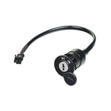 Key Switch for the Drive Medical Maverick, showing a black keyhole with an attached cable, essential for ensuring the scooter turns on properly when the battery is fully charged and connected.