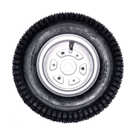Razor Dirt Quad Rear Wheel Assembly (Versions 1 - 18), showcasing a black tire with a silver rim, designed for durability and compatibility with specified Razor Dirt Quad models.