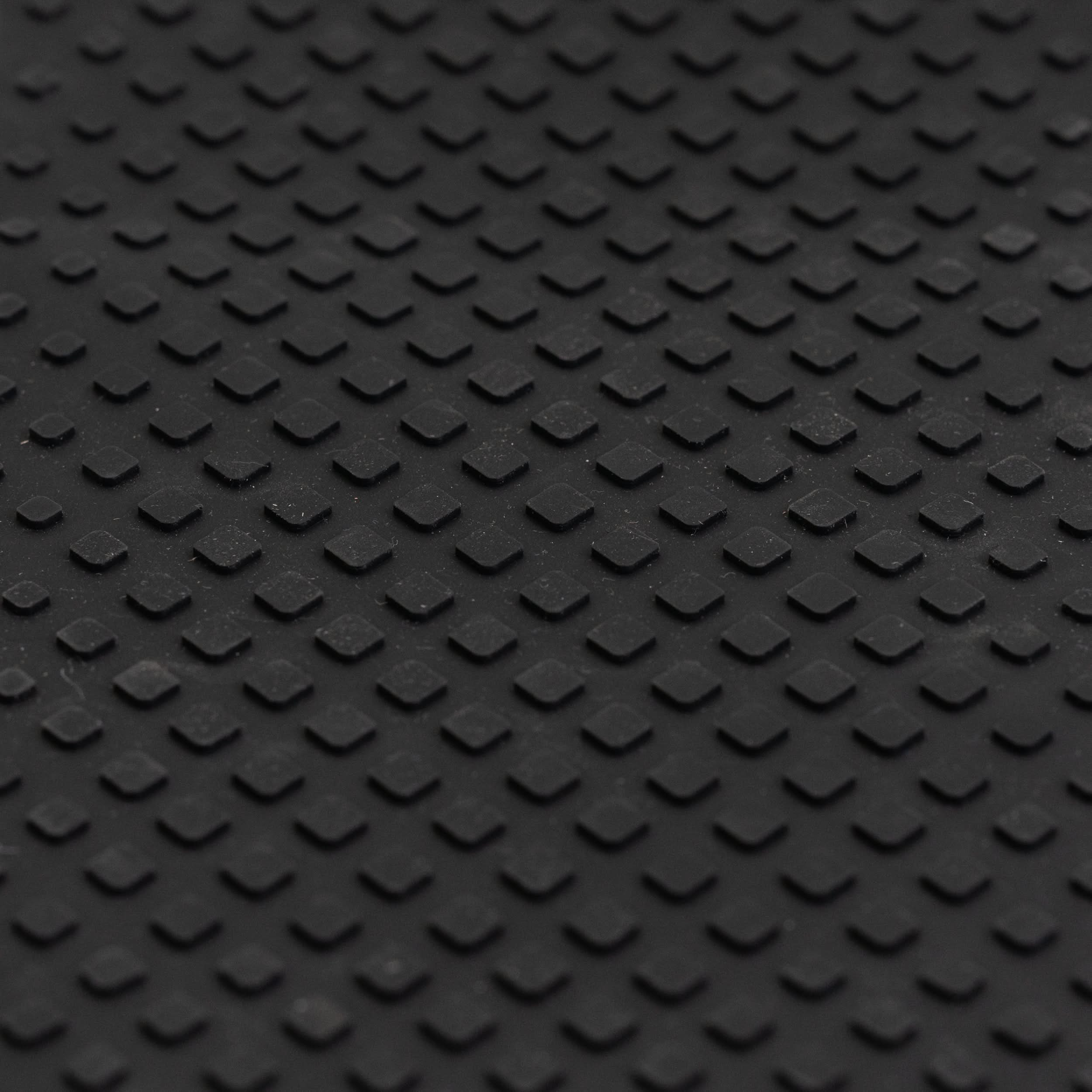Close-up view of a textured nonslip black rubber Footmat for Ninebot by Segway ES1 & ESB Electric Scooters, designed to rejuvenate the deck frame with peel-and-stick adhesive.