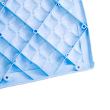 Seat for the Dynacraft Disney Princess Cinderella 24V Carriage, showcasing a close-up of its light blue plastic surface and mold, designed to seat two children and includes two seatbelts.