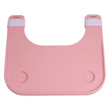Plastic Tray Table for Wheelchairs: A durable pink plastic bib with two holes, designed for easy attachment to wheelchair armrests, providing a sturdy surface for various activities with a built-in cup holder.