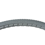 24x1-3/8 (37-540) Solid Urethane Orion Wheelchair Tire with P163 Street Tread (Primo), showcasing a curved tire with visible surface-gripping tread and writing, designed for manual wheelchairs.