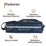 Insulated Cargo Bag for the Coleman AT125-EX ATV featuring black nylon fabric with white text, a carrying strap, multiple fastening straps, and reflective safety tape for visibility.