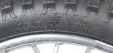 Close-up of the 14 (2.50-14) Front Wheel Assembly for Dirt Bikes, featuring a knobby tire with visible text, inner tube, and wheel bearings, compatible with various 50cc dirt bike models.