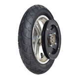 Rear Wheel Assembly for the Razor RSF350 Electric Sport Bike featuring a black tire with a black rim, brake disc, pneumatic Clever tire, inner tube, chain plate guide, sprocket, and bearings.