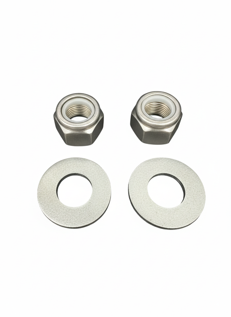 Four metal washers on a white background