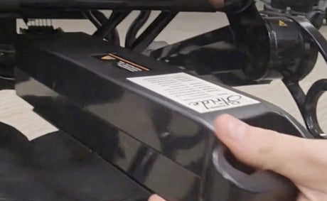 Removing the Golden Technologies MBE-0002 24V 10Ah lithium ion battery pack from a Golden Stride GP301 power chair