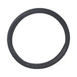 26x1.95 Black Kross Plus Bicycle Tire from Sunlite, showcasing detailed tread pattern, ideal for bike replacements, prominently featured in a close-up view.