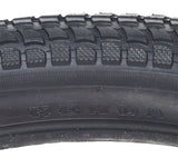 Close-up of a 26x2.125 Black Cruiser 927 Bicycle Tire showcasing detailed tread patterns from Sunlite, ideal for replacing old bike tires with a reliable, high-quality option.