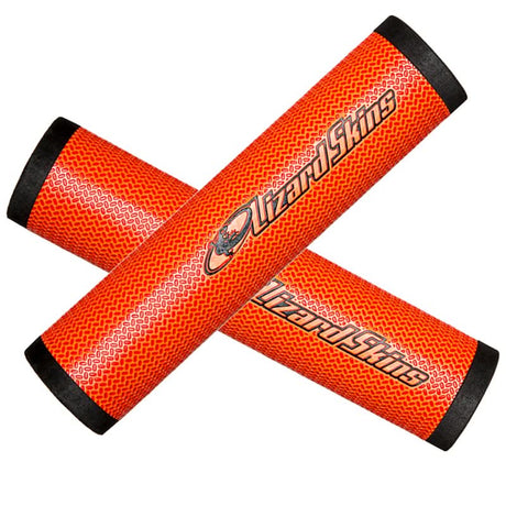 DSP 30.3 mm Grips for Bikes & Scooters featuring two orange sticks with black handles, designed for comfort and lightweight performance with DuraSoft Polymer and feather-lite lock tape technology.