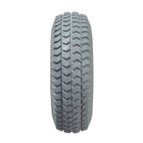 Close-up of the 3.00-4 (10x3, 260x85) Pneumatic Rear Wheel Assembly for Rascal 235, 245, 305, and 600 Series electric mobility scooters, highlighting the tread pattern and rubber texture.