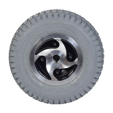 9x3.50-4 Pneumatic Rear Wheel Assembly for the Rascal 240, featuring a metal rim and aggressive C203 tread pattern on a Primo Grande Knobby tire, ideal for enhanced gripping power.