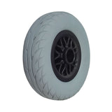 Rear Wheel Assembly for the Merits Mini Coupe (S539) Mobility Scooter, featuring a black rim and flat-free solid tire with directional tread. Ideal for replacing damaged or worn-out wheels.