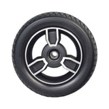 9 Front Wheel Assembly for the 4-Wheel Pride Revo 2.0 (S67), featuring a black low-profile solid tire, two-tone black and silver rim, and pre-installed bearings.