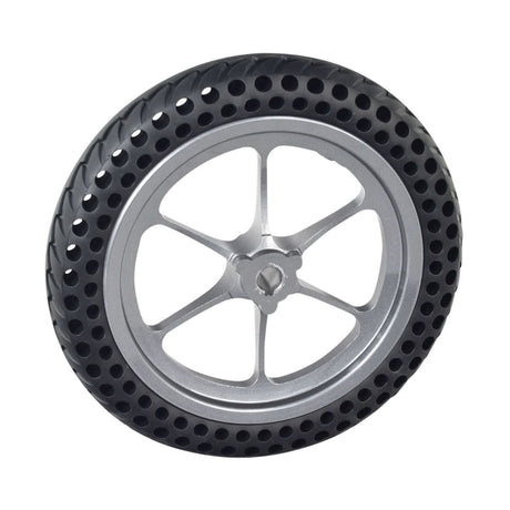 Drive Wheel Assembly with Silver Rim for the Jazzy Passport Power Chair, featuring a black tire with a silver rim, designed for optimal performance with a flat-free, honeycomb-constructed tire.
