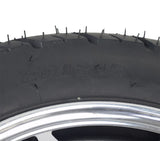 16 Front Wheel Assembly for the Baja Raptor 2 (BA300) Scooter, featuring a large diameter rubber tire with sport-style tread, mounted on a 10-spoke silver rim with pre-installed bearings.