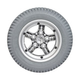 14x3 Flat Free 5-Spoke Wheel Assembly with Silver Rim for the Quantum Q600, Q600XL, Q6000Z, and R4000 Power Chairs, featuring a close-up of the tire and silver rim with detailed tread.